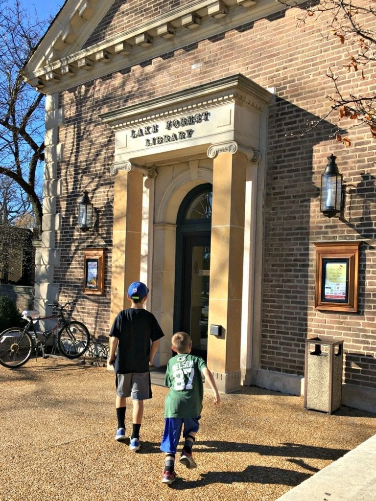 Youth running to the entrance of Lake Forest Library